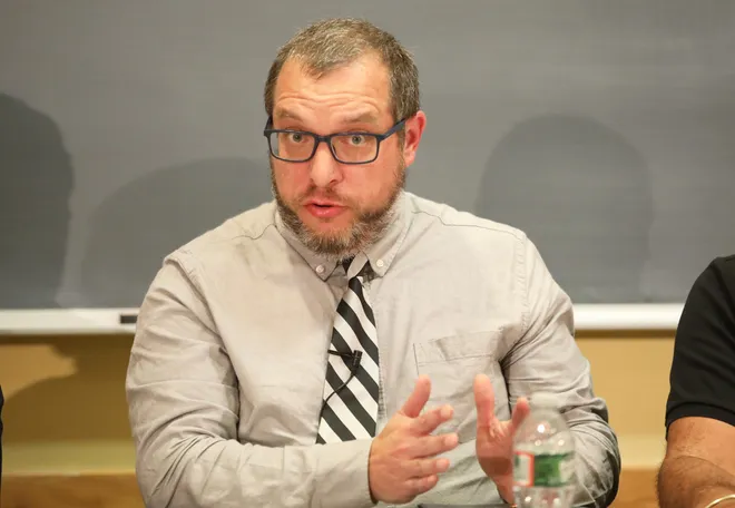Me, answering a question while gesturing wildly with both hands during the Fall River Community Media Candidate Forum on Tuesday, October 7th.

My silver and black tie was knocked askew while putting the microphone on it.